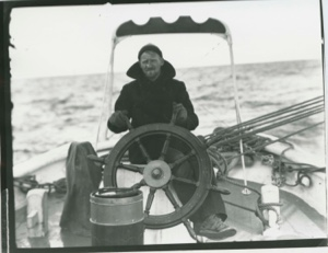 Image: Brierly at the wheel on board the Bowdoin